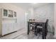 Dining area featuring a unique accent wall and convenient access to the kitchen at 4568 67Th N St, St Petersburg, FL 33709