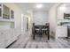 Inviting dining area connects to kitchen and hallways, providing a cozy space for meals at 4568 67Th N St, St Petersburg, FL 33709