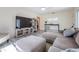 Comfortable living room features neutral tones, ample seating, and wood-look flooring at 4568 67Th N St, St Petersburg, FL 33709