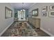 Inviting dining room featuring natural light, elegant decor, and comfortable seating at 4811 Sandy Glen Way, Wimauma, FL 33598
