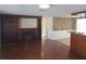 Inviting living area with a fireplace and easy access to the adjacent kitchen area at 5130 Tilson Dr, New Port Richey, FL 34652