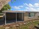 Covered patio with stepping stone accents at 5130 Tilson Dr, New Port Richey, FL 34652