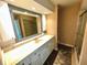 Spacious bathroom with a vanity and standing shower at 5454 Saddlebrook Way # 2, Wesley Chapel, FL 33543