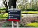 Community sign directing residents and guests to Lakeside Village, Rental Office, Resort Registration, the Spa, and Sports Village at 5454 Saddlebrook Way # 2, Wesley Chapel, FL 33543