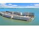 Stunning aerial view of waterfront condos boasting gorgeous water views at 6075 Shore S Blvd # 509, Gulfport, FL 33707