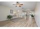 Spacious living room with light wood flooring, neutral walls, and lots of natural light at 6075 Shore S Blvd # 509, Gulfport, FL 33707