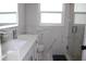 Elegant bathroom featuring a walk-in shower, modern vanity, and stylish fixtures at 6225 Imperial Ky, Tampa, FL 33615
