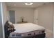 Bright bedroom featuring a comfortable bed, warm lighting, and serene ambiance at 6225 Imperial Ky, Tampa, FL 33615