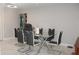 Elegant dining room with modern table and chairs, creating a welcoming atmosphere for gatherings at 6225 Imperial Ky, Tampa, FL 33615