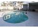 Beautiful backyard pool area featuring a screened enclosure, providing a relaxing outdoor space at 6225 Imperial Ky, Tampa, FL 33615
