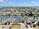 Waterfront community featuring single-Gathering homes with docks and a canal system at 6511 Senegal Palm Way, Apollo Beach, FL 33572