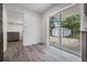 Eating area with sliding glass doors leading to backyard shed and patio at 7249 Berry Rd, Zephyrhills, FL 33540