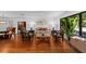 Elegant living room with decorative walls, hardwood floors and sun-drenched windows at 838 Park Ct, Palm Harbor, FL 34683