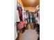 Large walk-in closet with ample storage for clothes and shoes at 9414 Northcliffe Blvd, Spring Hill, FL 34606