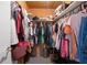 Large walk-in closet with ample storage for clothes and shoes at 9414 Northcliffe Blvd, Spring Hill, FL 34606