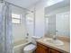 Bathroom with a shower/tub combination and vanity at 9608 Rolling Cir, San Antonio, FL 33576
