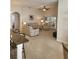 Spacious living area with stylish furnishings, easy access to the lanai, and a comfortable seating arrangement at 9608 Rolling Cir, San Antonio, FL 33576
