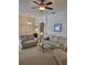 Comfortable living room area with striped sofas at 9608 Rolling Cir, San Antonio, FL 33576