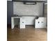 Indoor wet bar area featuring light mosaic backsplash with black trim and wood floors at 10106 Wheatley Hills Ct, Tampa, FL 33615