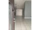 Entryway with tile floors, a chandelier, and large windows providing natural light at 10106 Wheatley Hills Ct, Tampa, FL 33615