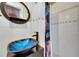 Bathroom featuring vessel sink, mirror, and tiled shower at 105 6Th Nw St, Ruskin, FL 33570