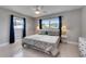 Bedroom with neutral walls, fan, and light from two windows at 105 6Th Nw St, Ruskin, FL 33570