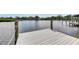 View of the waterfront dock with lighting on the posts provides access to the water at 105 6Th Nw St, Ruskin, FL 33570