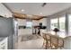 Bright kitchen featuring stainless appliances, white cabinets, and an island with seating at 105 6Th Nw St, Ruskin, FL 33570