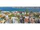 Expansive aerial captures the charming residential neighborhood, with waterways surrounding a quaint seaside community at 108 14Th Ave # 2, St Pete Beach, FL 33706