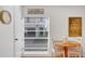 Comfortable dining area with Florida wall art at 108 14Th Ave # 2, St Pete Beach, FL 33706