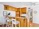 Modern kitchen with seating at the bar top, and appliances at 108 14Th Ave # 2, St Pete Beach, FL 33706