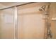 The shower is equipped with a shower head, handheld shower, and grab bar at 108 14Th Ave # 2, St Pete Beach, FL 33706