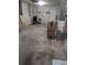 The unfinished basement has a concrete floor and block walls at 10968 105Th Ave, Largo, FL 33778