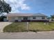Charming single-story home features an attached garage, neutral paint, and well-maintained front yard at 10968 105Th Ave, Largo, FL 33778
