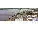 Waterfront neighborhood with pier, with various roof styles and a view of the bay at 11 Lafayette St, Bradenton, FL 34208