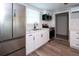 Updated kitchen features stainless steel appliances, white countertops, and sleek cabinetry at 11 Lafayette St, Bradenton, FL 34208