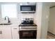 Modern kitchen features stainless steel appliances and white subway tile backsplash at 11 Lafayette St, Bradenton, FL 34208