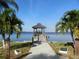 Scenic waterfront gazebo with views of the ocean and surrounded by beautiful palm trees at 11 Lafayette St, Bradenton, FL 34208