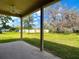 Spacious backyard with a covered patio perfect for outdoor enjoyment at 1105 Canyon Oaks Dr, Brandon, FL 33510
