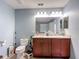 Bathroom highlighting a double sink vanity, toilet, and tile flooring at 1105 Canyon Oaks Dr, Brandon, FL 33510