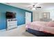 Bedroom highlighting a blue accent wall, ceiling fan, and closet at 1105 Canyon Oaks Dr, Brandon, FL 33510