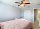 Bedroom with a large closet and a ceiling fan at 1105 Canyon Oaks Dr, Brandon, FL 33510