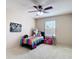 Bedroom featuring a window, ceiling fan and neutral carpet is ready for personalization at 1105 Canyon Oaks Dr, Brandon, FL 33510