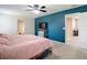 Comfortable main bedroom with a spacious layout, neutral carpet, and an ensuite bathroom at 1105 Canyon Oaks Dr, Brandon, FL 33510