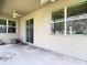 Covered patio with ceiling fan, offering a comfortable outdoor living space at 1105 Canyon Oaks Dr, Brandon, FL 33510