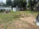 Large backyard with two storage sheds and fence at 1204 E Camellia Dr, Brandon, FL 33510