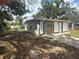 View of the exterior of this home with a fenced yard, offering privacy and charm at 1204 E Camellia Dr, Brandon, FL 33510