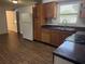 Kitchen features wooden cabinets and a stainless steel sink at 1204 E Camellia Dr, Brandon, FL 33510