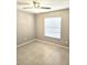 Bedroom with a bright window and tile flooring at 12121 Wildbrook Dr, Riverview, FL 33569