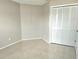 Bedroom with tile flooring and a closet at 12121 Wildbrook Dr, Riverview, FL 33569